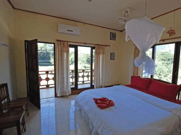 Jammee Guesthouse Vang Vieng Bagian luar foto